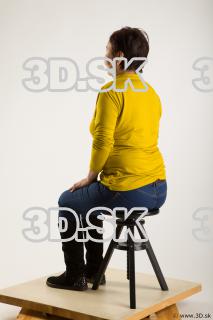 Sitting reference of yellow sweater blue jeans Gwendolyn 0002